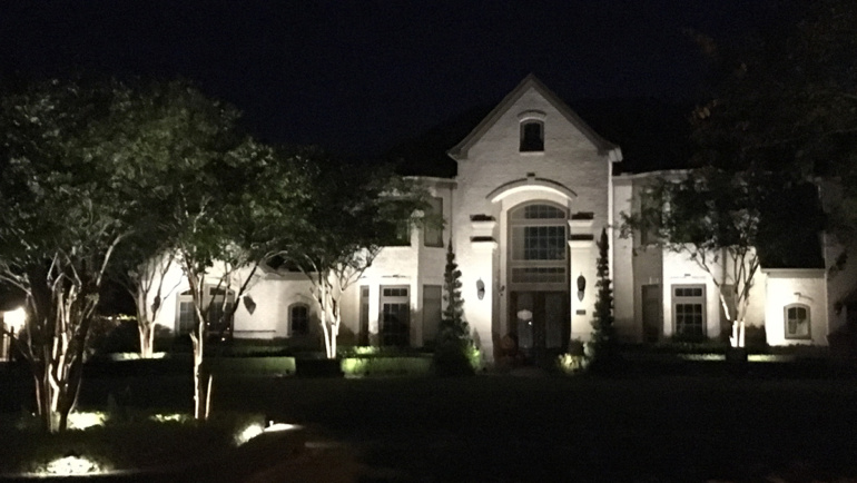 Modern Estate Shines at Night